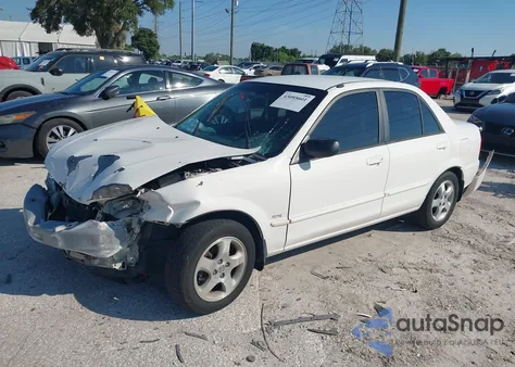 1999 Mazda Protege Es from USA, damaged, VIN JM1BJ2216X0126512